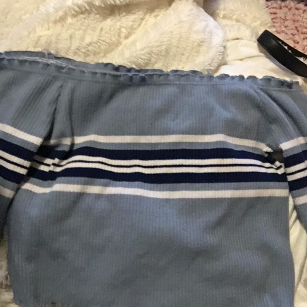 Blue off the shoulder shirt